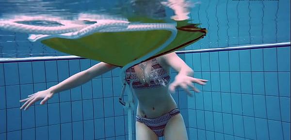  Big tits teenie Liza Bubarek swimming naked in the pool